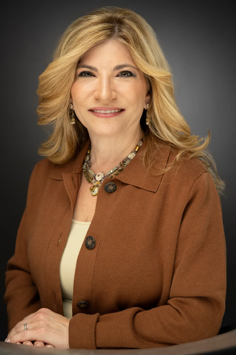 A relaxed, genuine laugh during a Len Marks Photography headshot session