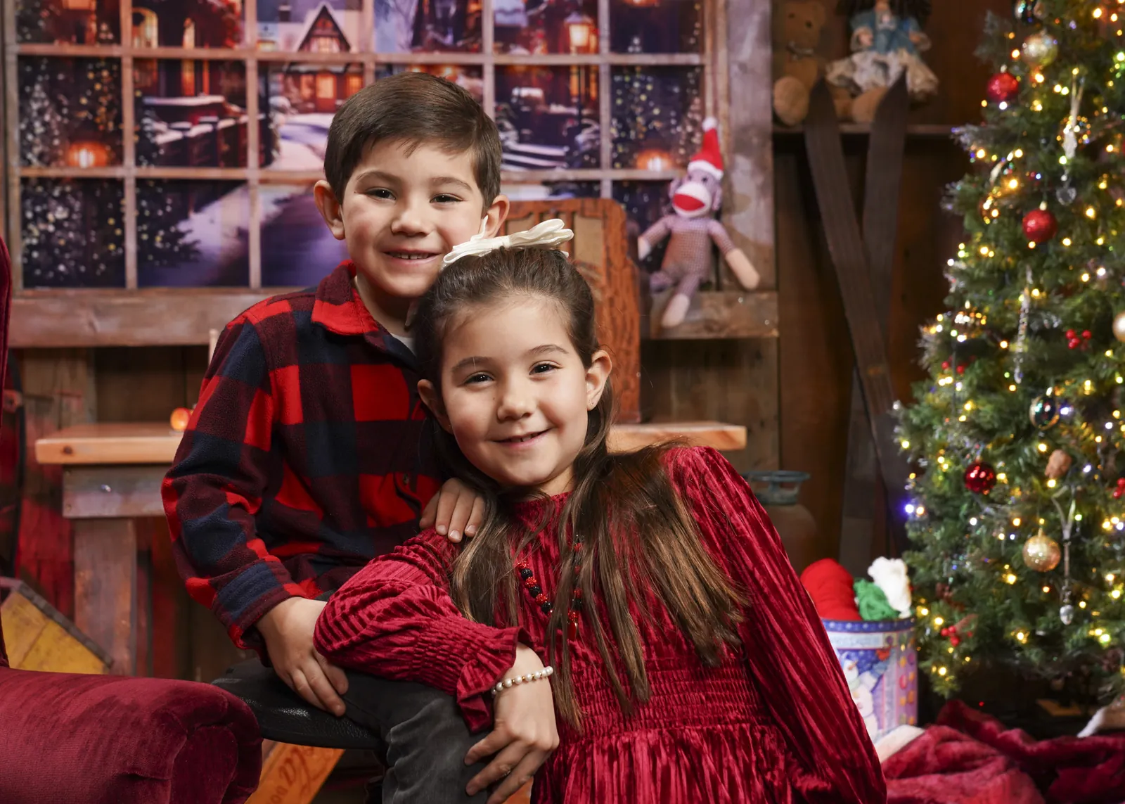 A brother and sister on the holiday set at the Conklin Barn
