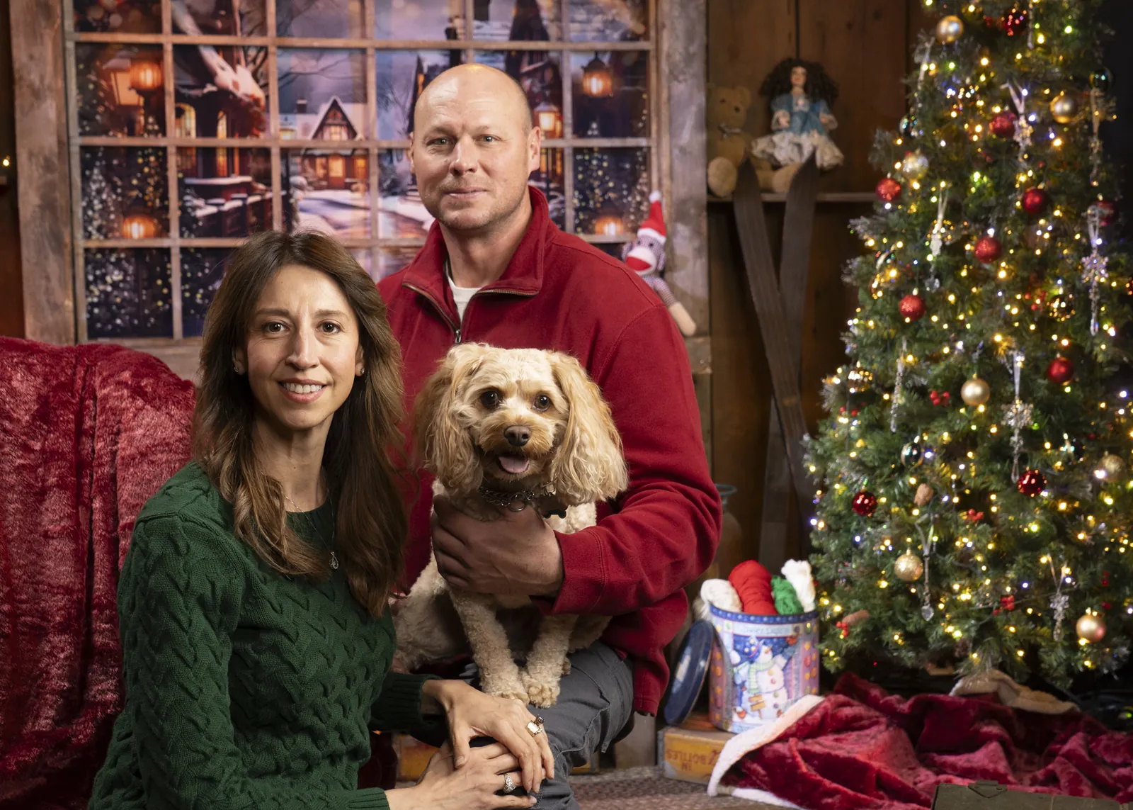 A couple with their baby and dog at the Conklin Barn